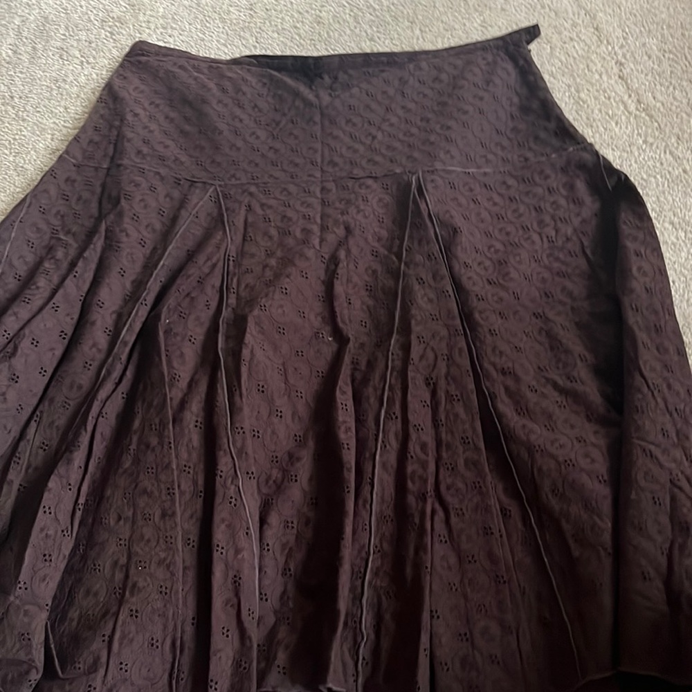 Long brown skirt with embroidered details